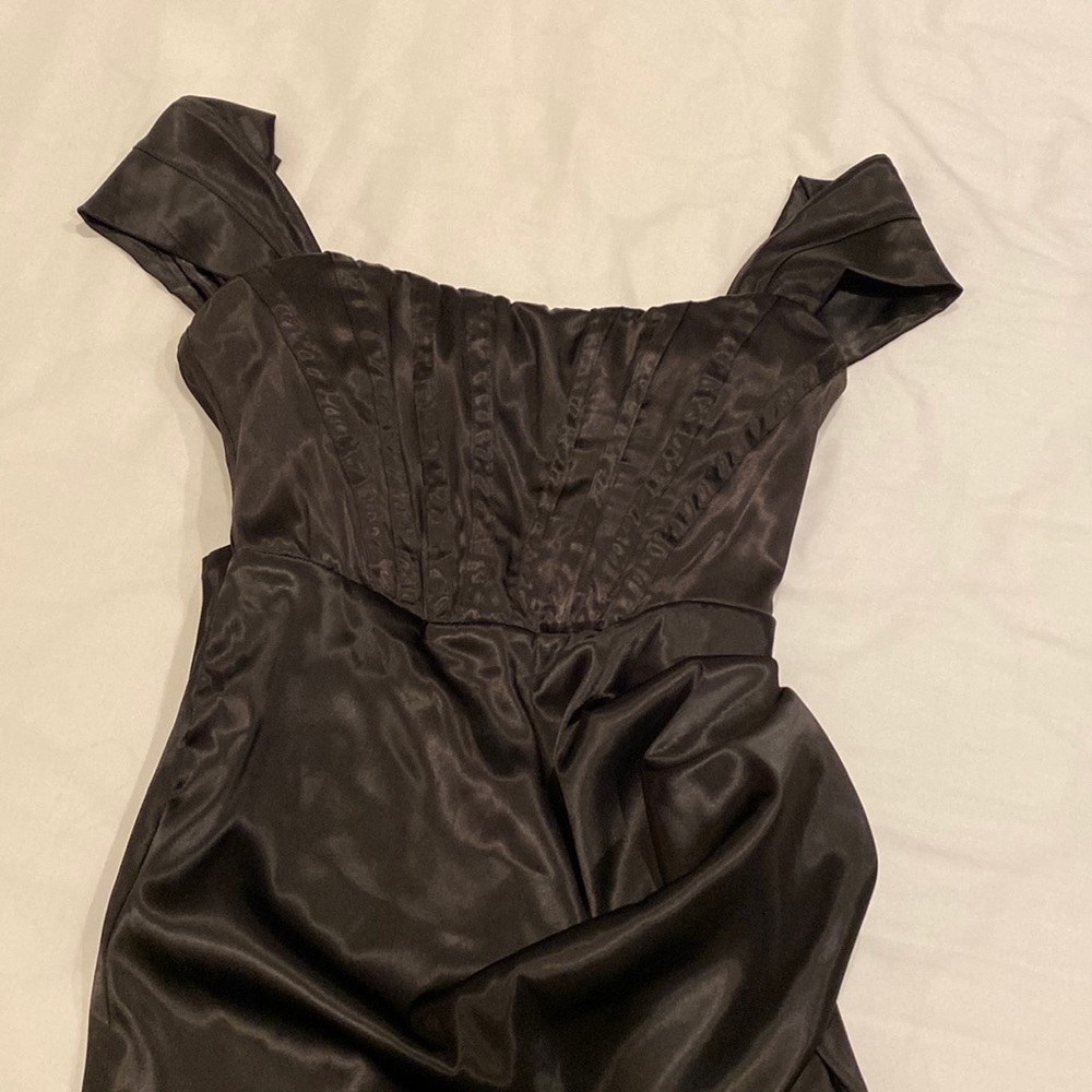 Corset black dress very elegant size small fits 6/8 split on one side